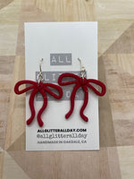 Gorgeous skinny ribbon bow dangle earring
