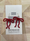 Gorgeous skinny ribbon bow dangle earring