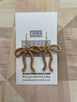 Gorgeous skinny ribbon bow dangle earring